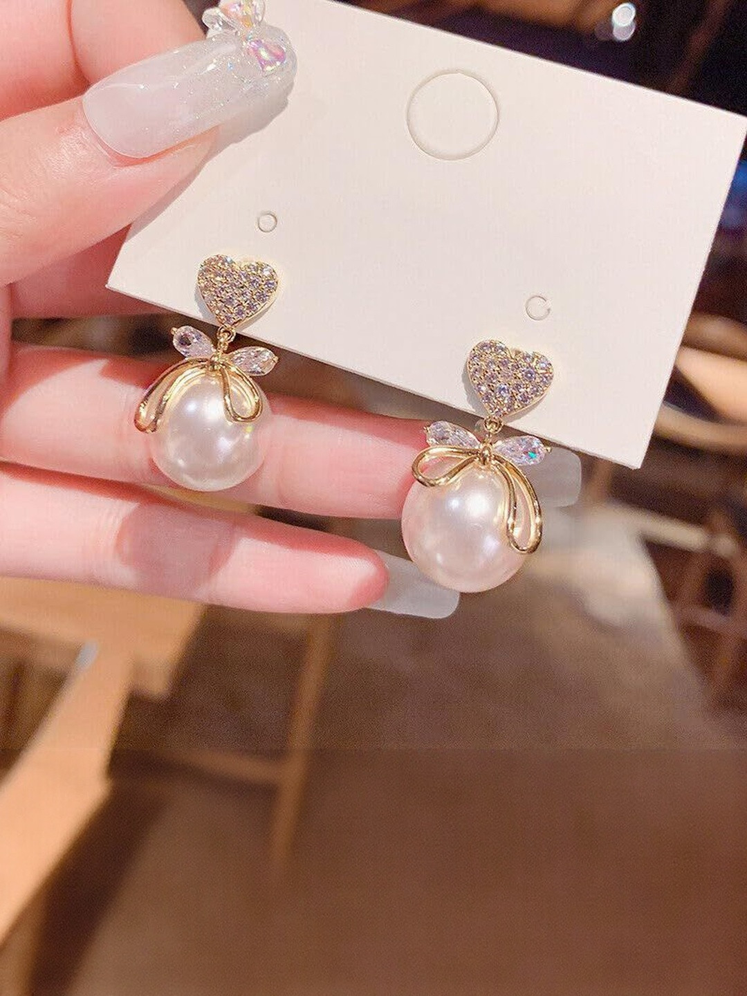 Tosilite Artificial Stones Studded And Beaded Heart Shaped Drop Earrings