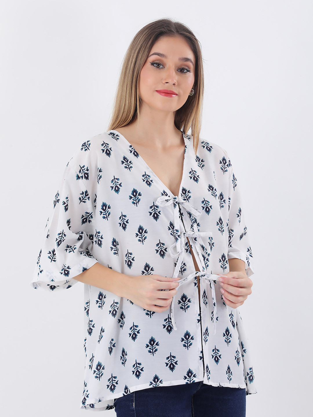 Qurvii  Women Printed Flared Sleeve Loose Fit Tie-Ups Styling Top