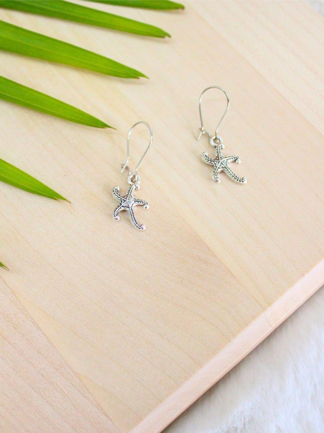 MCREATION4U Silver Plated Starfish Shaped Earrings