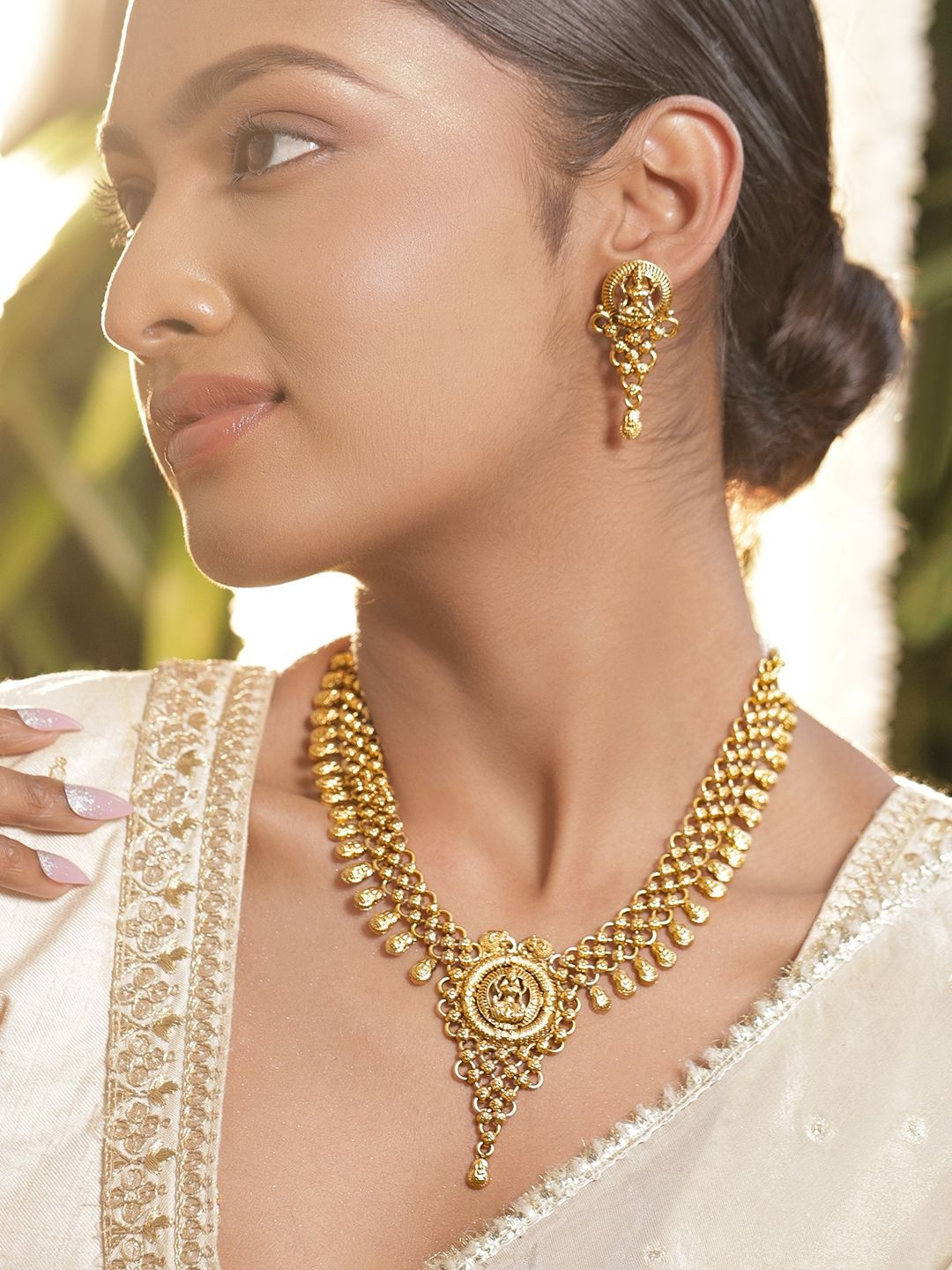 Rubans 22K Gold-Plated Handcrafted Golden Beaded Detail Lakshmi Motif Temple Jewellery Set