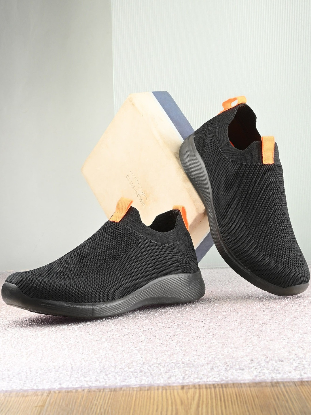 Roadster Men Black Solid Slip-On Shoes