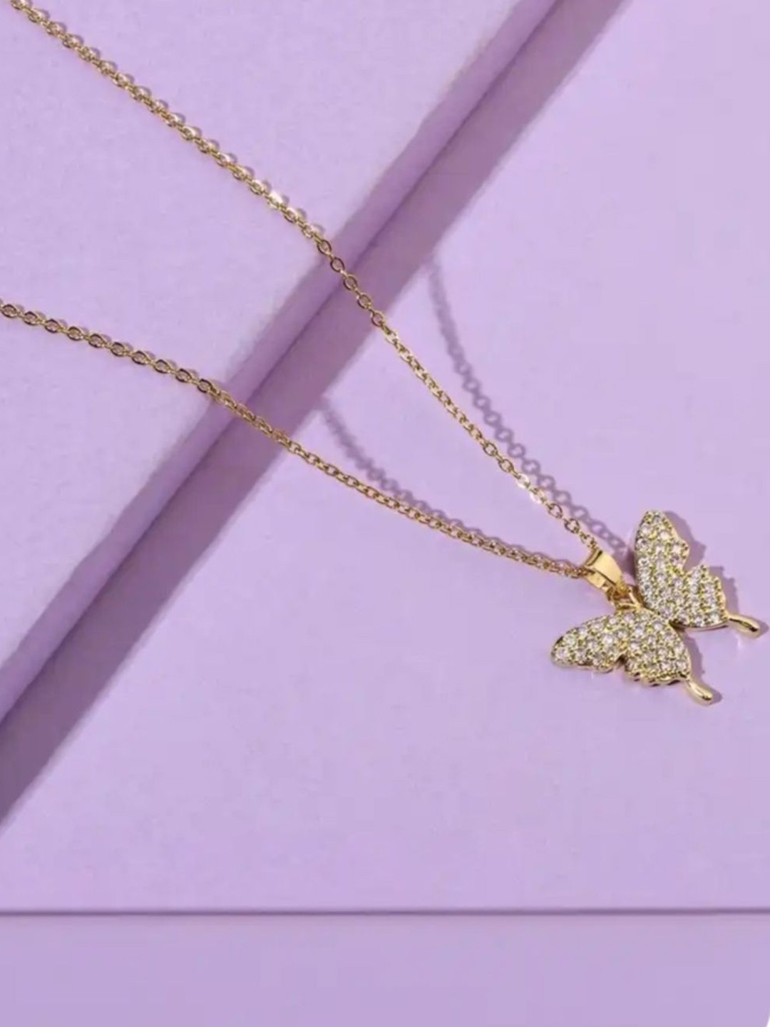 Ruchi trading company Gold-Plated Artificial Stones Studded Butterfly Pendant With Chain