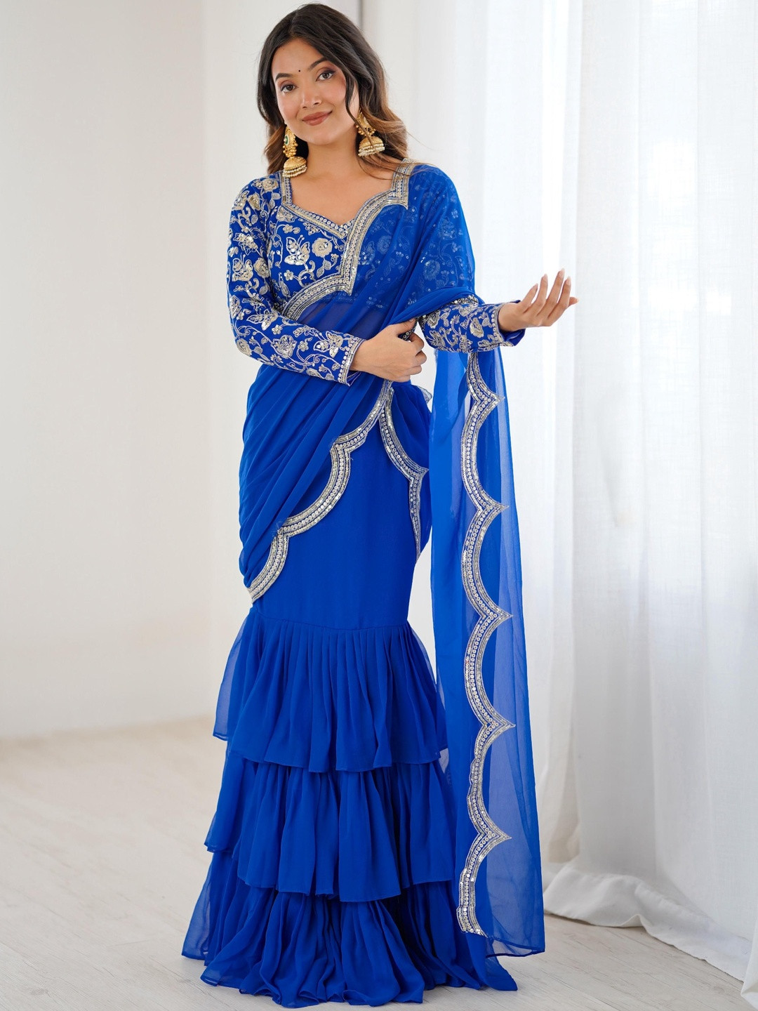 KALINI Women Blue Poly Georgette Embellished Sequinned Ruffle Saree