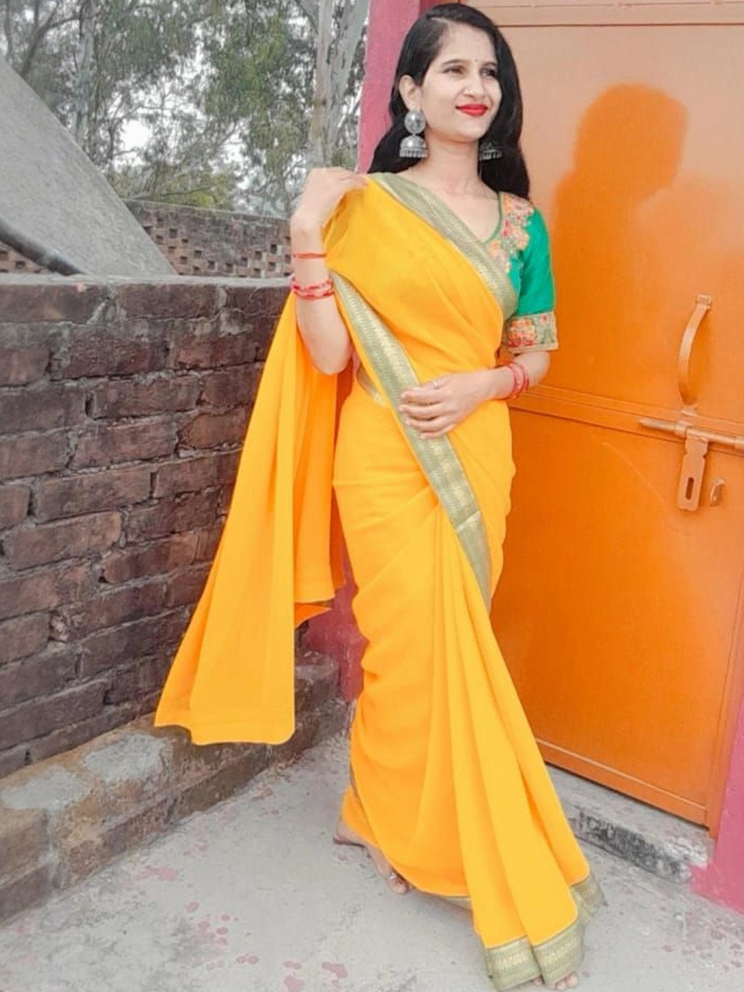 Moda Rapido Women Yellow & Green Zari Poly Chiffon Lace Border Saree
