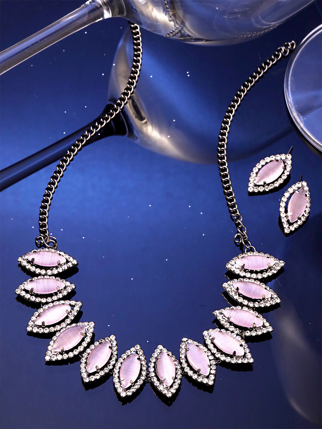 Yellow Chimes Pink Stone & White Crystal Studded Leaf Designed Jewellery Set