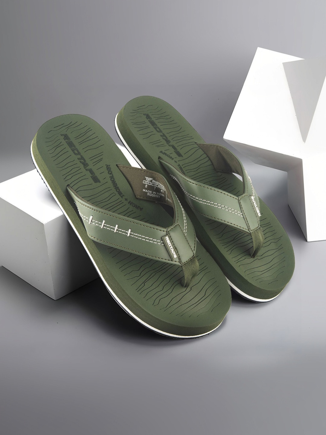 Red Tape Men Thong Flip-Flops Rs. 399 - Myntra