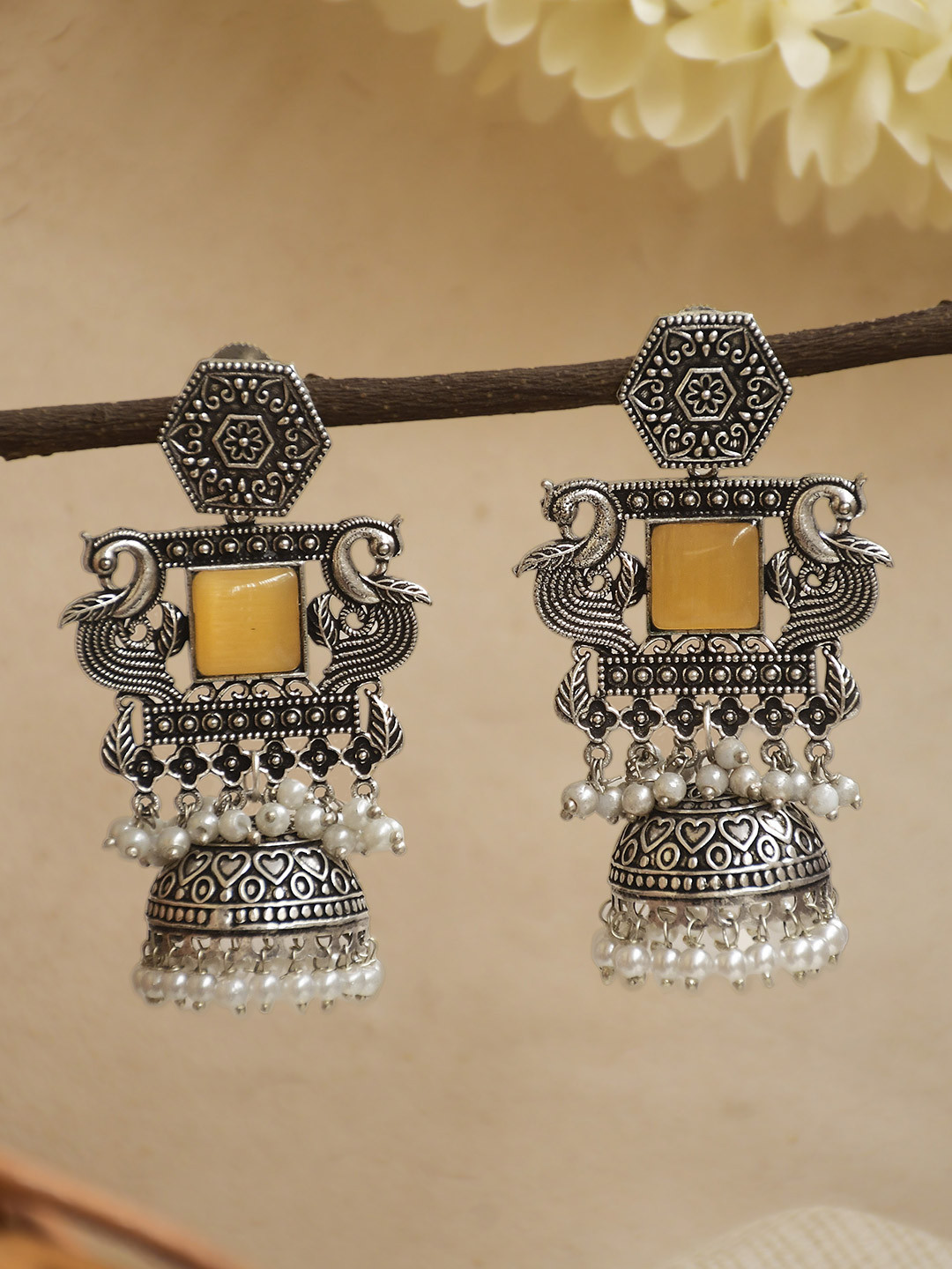 NAMAN ARTS Silver Plated Artificial Stones Studded Peacock Shaped Jhumkas