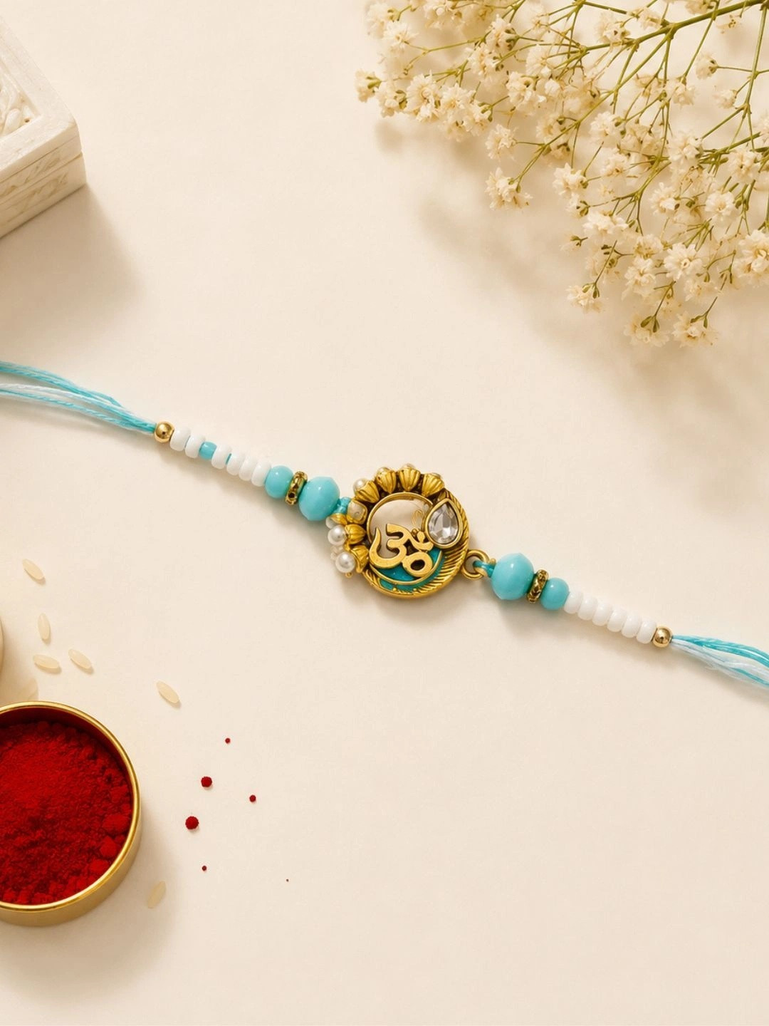 eCraftIndia Multicoloured Swastik & Om Religious Rakhi and Roli Chawal