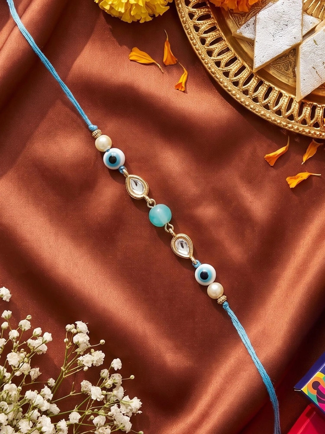 KARATCART Men Light Blue Bead Evil Eye Kundan Bhaiya Rakhi with Roli & Chawal Thread Rakhi