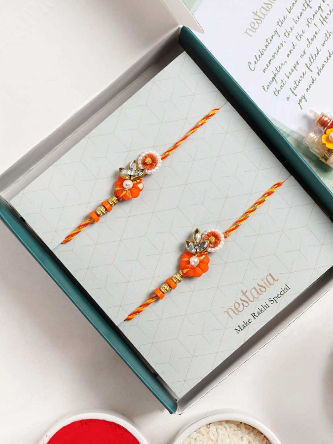 Nestasia Saffron Petal Rakhi Set