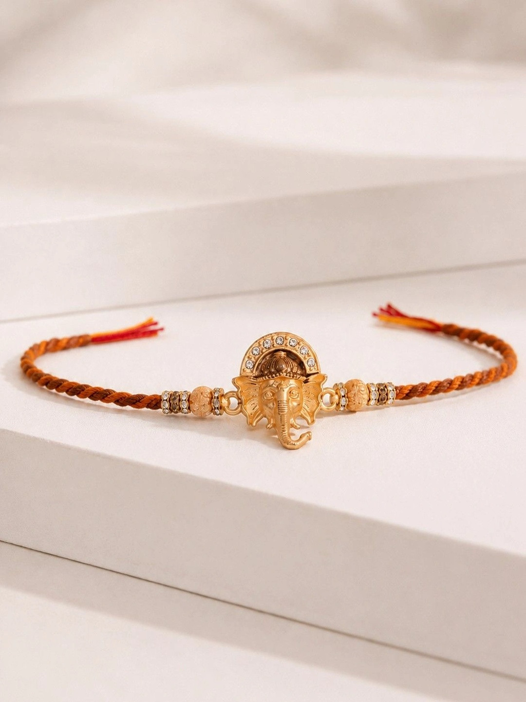 Deity Inspired CZ Embellished Ganpati Rakhi | Voylla Rakhi