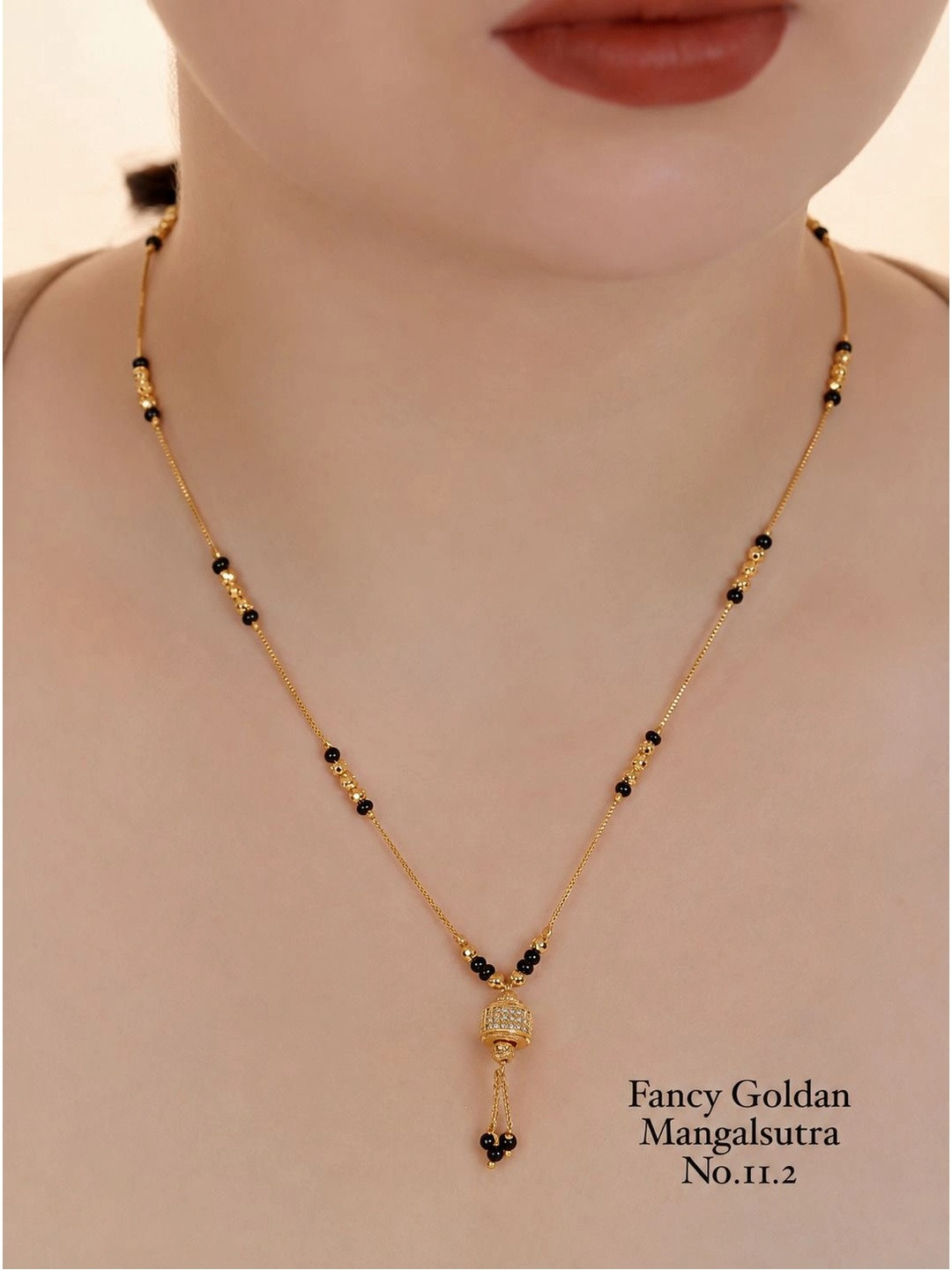 Queenzart Gold-Plated Artificial Stones and Beads Mangalsutra