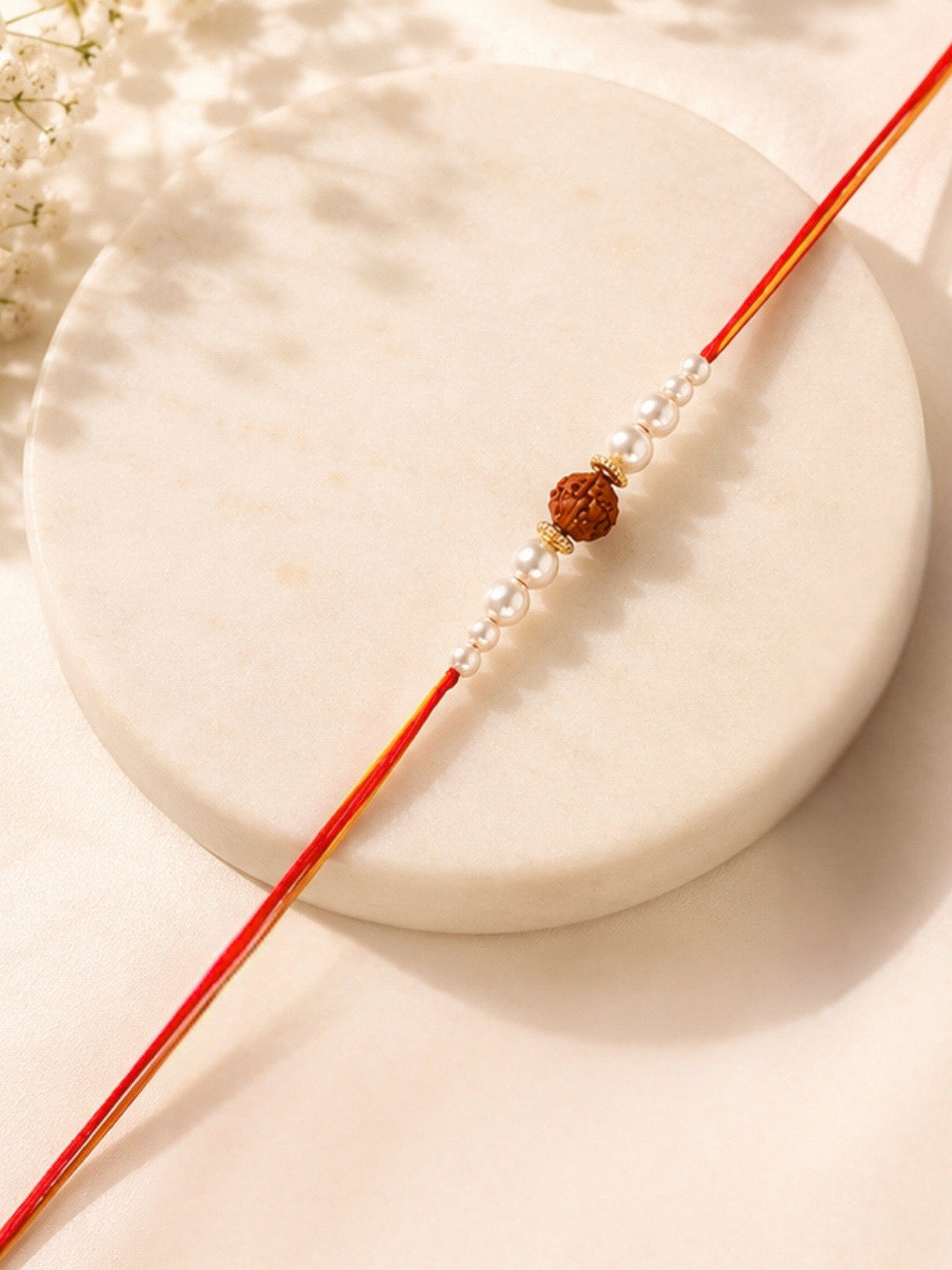 AccessHer Red & White Pearl Studded Rudraksh Rakhi with Roli Chawal & Greetings Card