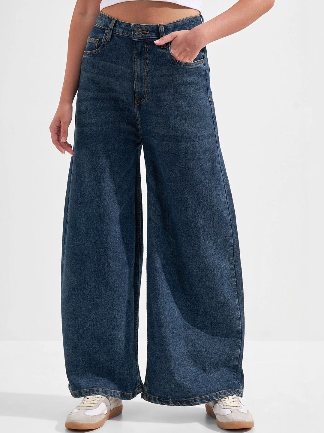 Tokyo Talkies Women Flared Mid-Rise Light Fade Stretchable Jeans