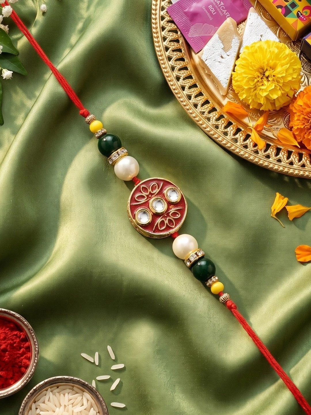 KARATCART Red Meenakari Floral Design Kundan Rakhi with Roli & Chawal