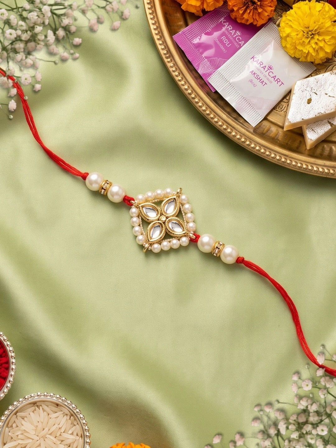 KARATCART Weight Floral Design Kundan Rakhi with Roli Chawal