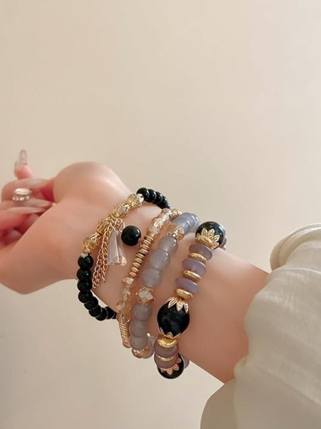 Zaphariq Women 4 Crystals Charm Bracelet