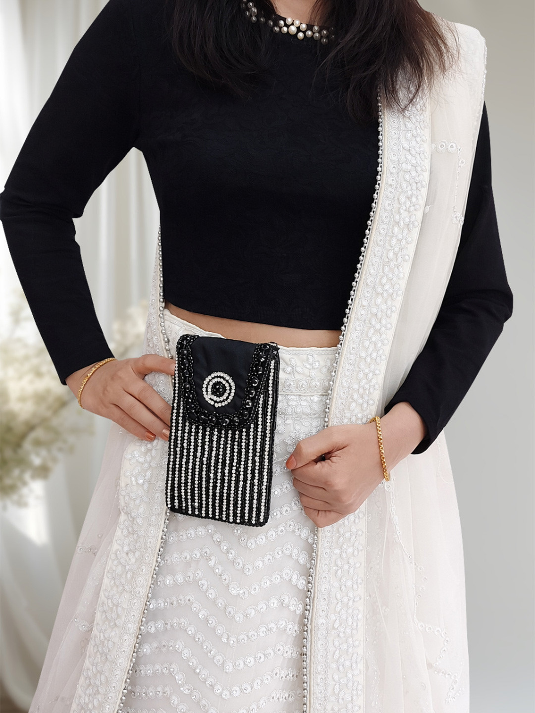 Kaarnis Black Aura Embellished Mobile Bag
