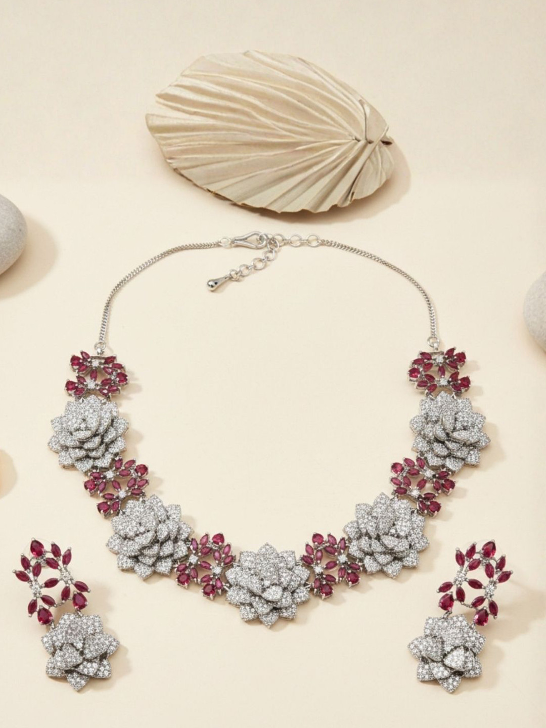 IKSAVA Silver-Plated American Diamond Studded Rose-Motif Necklace & Drop Earrings