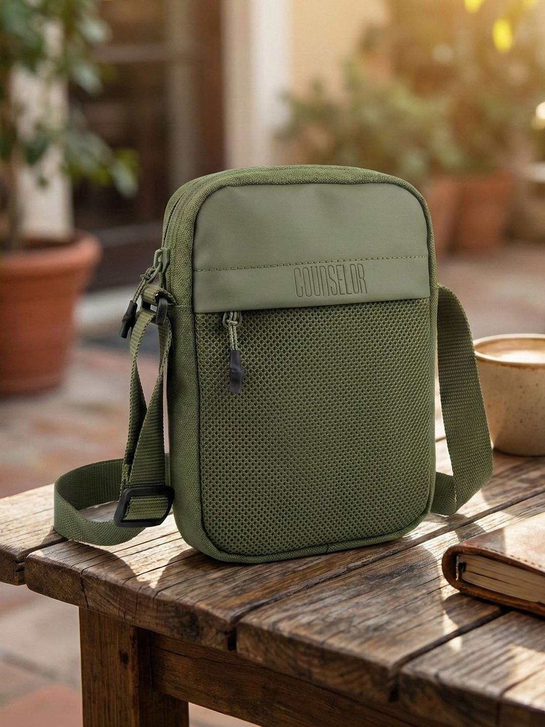 COUNSELOR Textured Sling Bag