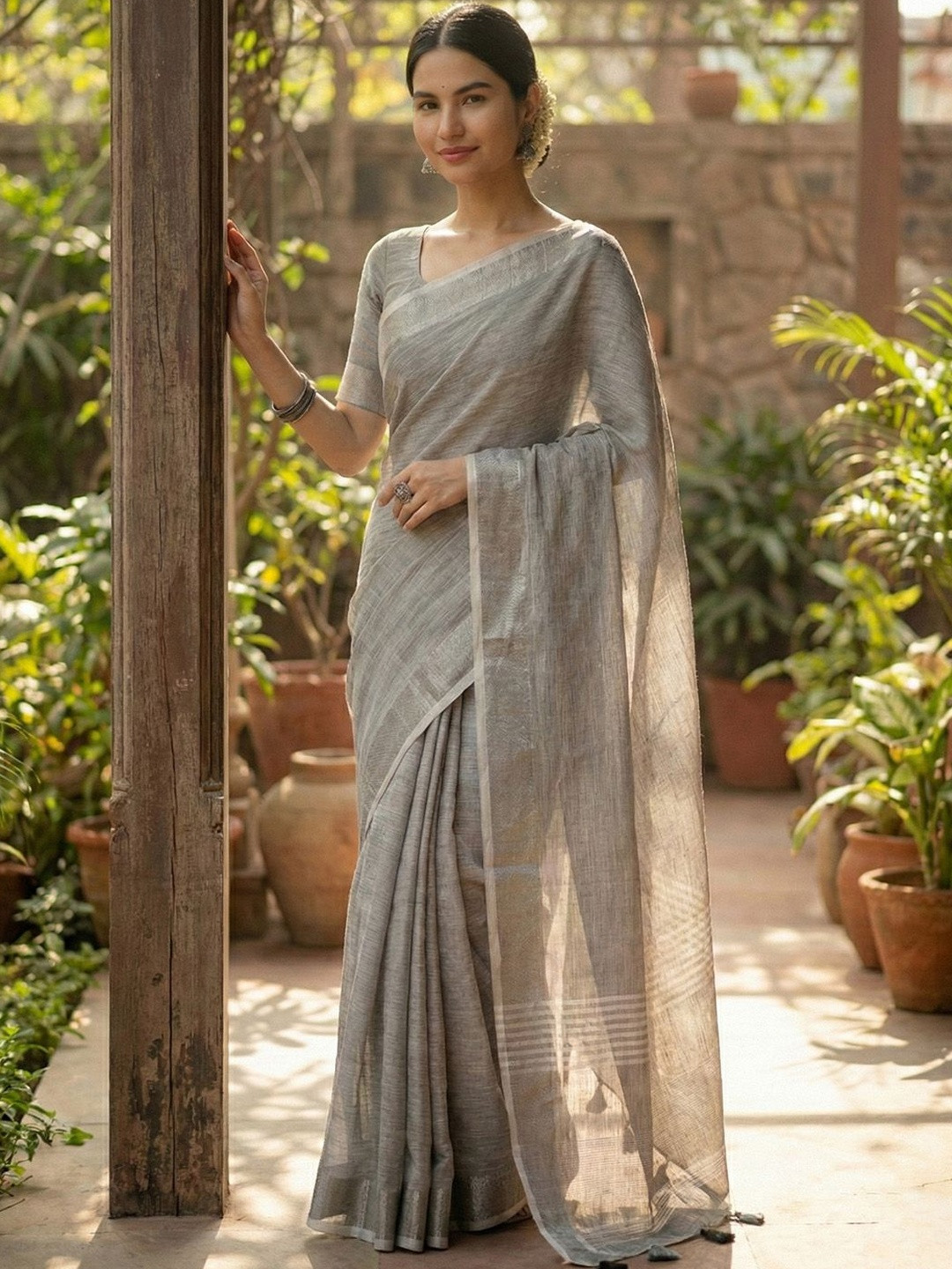 Sutriti Woven Design Zari Linen Blend Saree