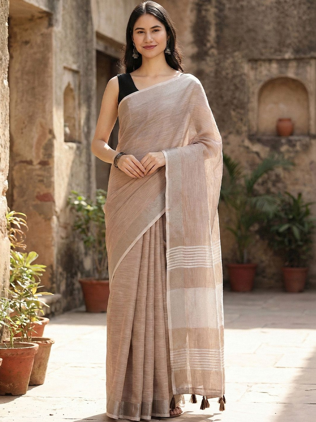 Sutriti Woven Design Zari Linen Blend Saree