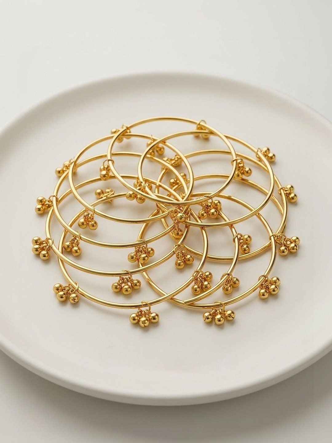 Anouk Women Set of 8 Traditional Ghungroo Gold Plated Kashmiri Bangles