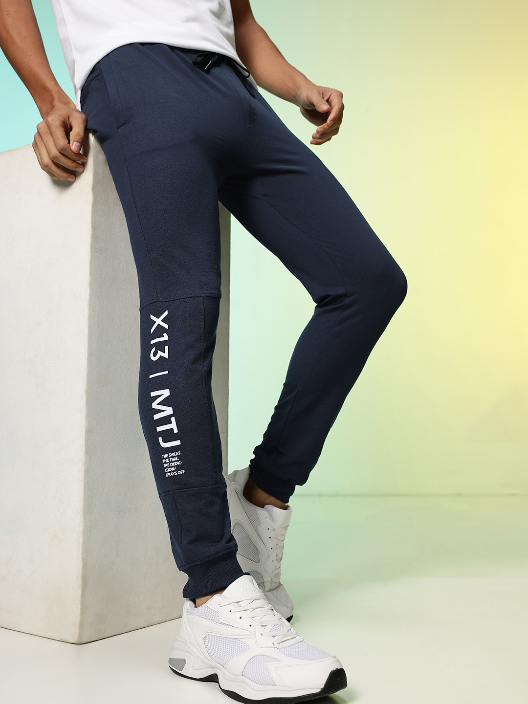 HRX by Hrithik Roshan Men Solid Joggers with Typography Detail