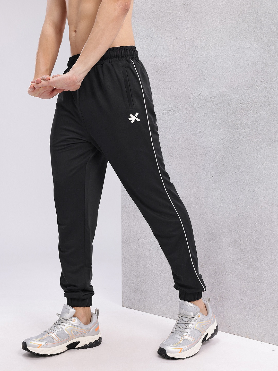 HRX By Hrithik Roshan Men Solid Training Rapid-Dry Track Pants