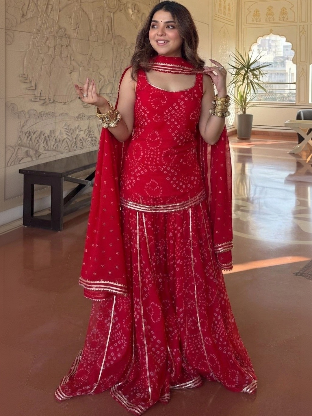 KALINI Women Bandhani Printed Regular Gotta Patti Silk Georgette Kurta with Sharara & With Dupatta