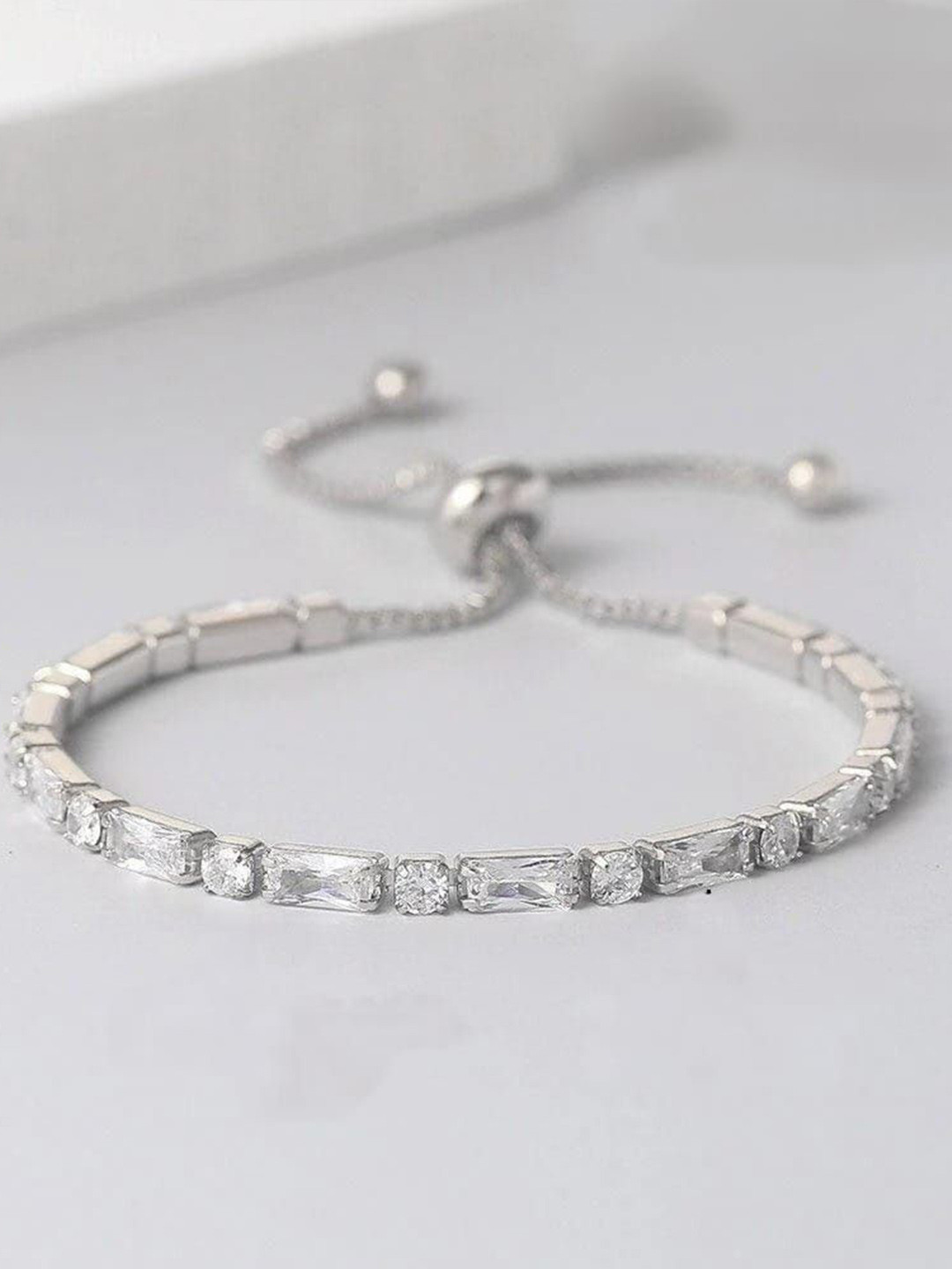 DressBerry Silver-Plated American Diamond Studded Charm Bracelet