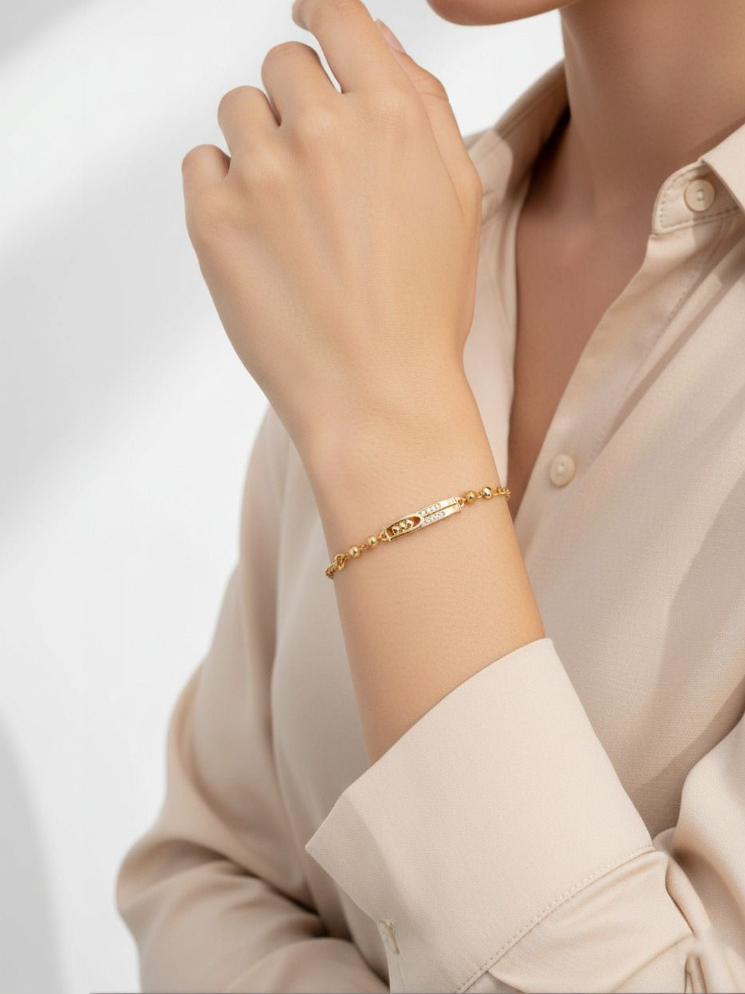 DressBerry Women Brass American Diamond Gold-Plated Link Bracelet