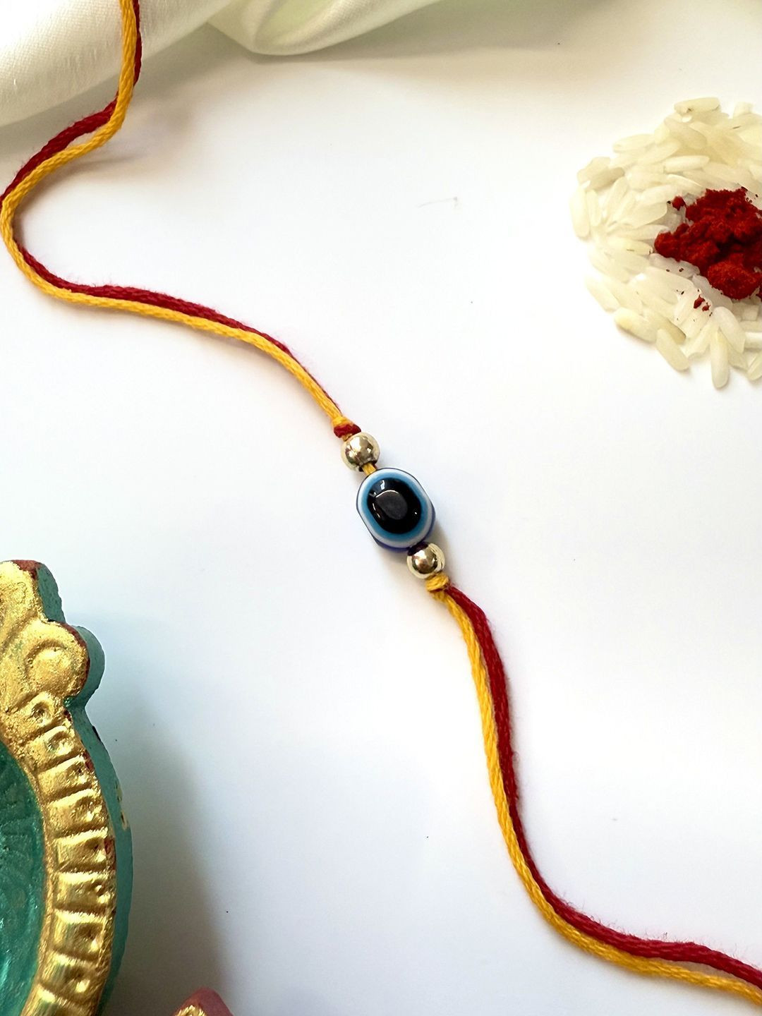 ISHKAARA Evil Eye Energy Thread Rakhi
