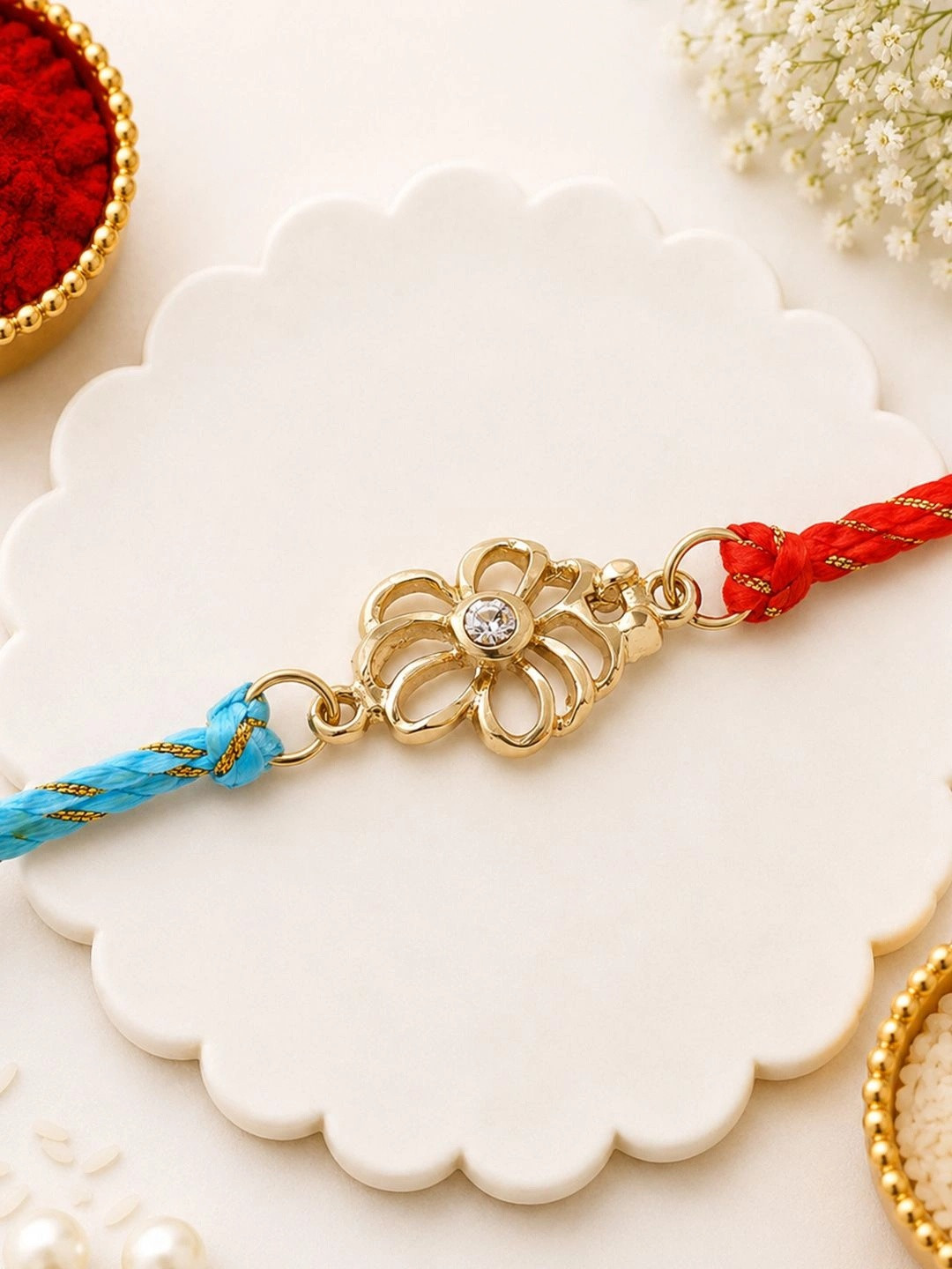 Estele Gold-Plated Crystal Stone Studded Flower Charm Rakhi
