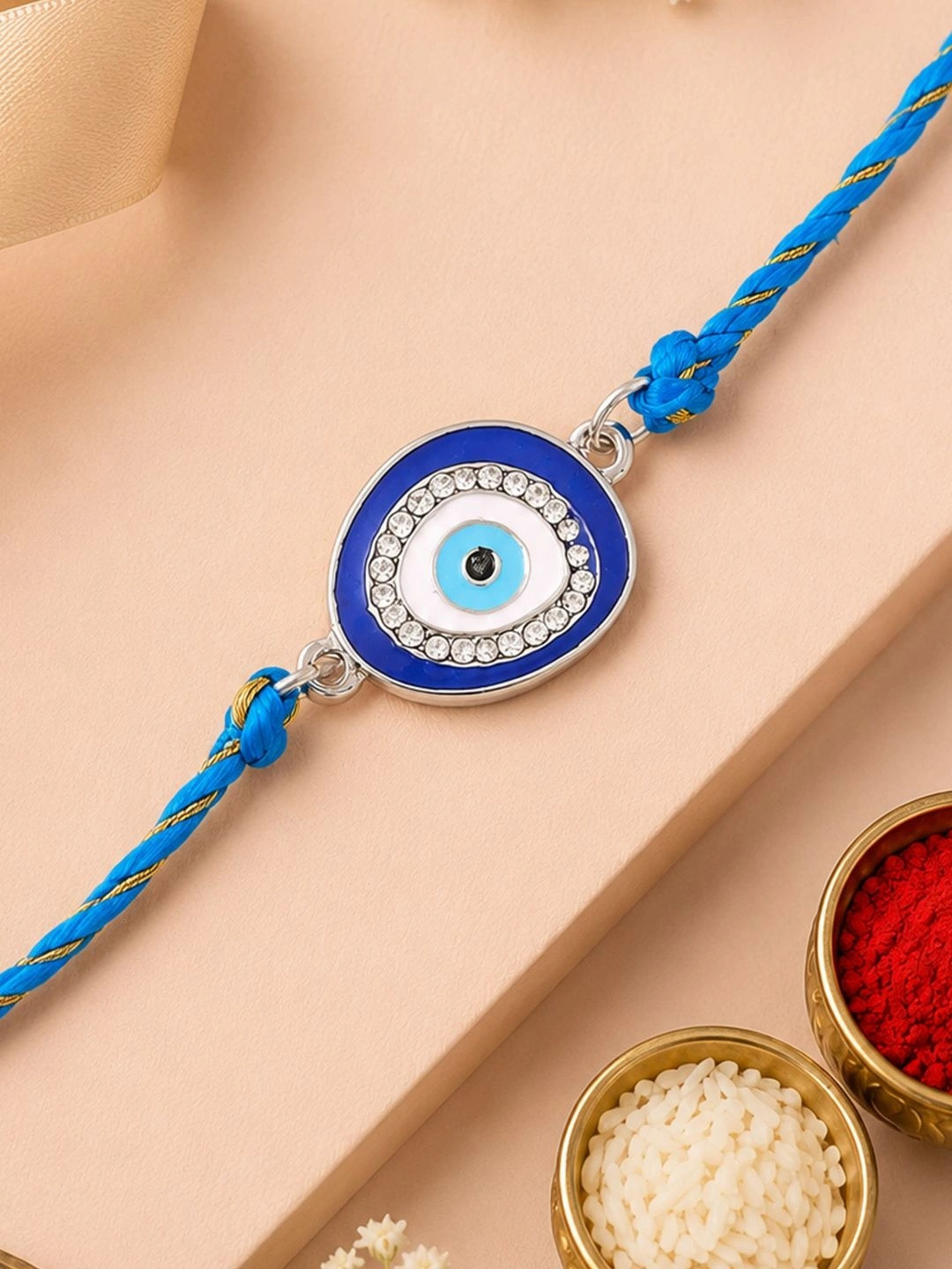 Estele Gold-Plated Stone-Studded Evil Eye Charm Rakhi