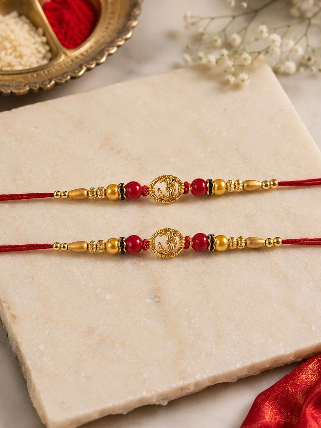 Anouk Unisex Set Of 2 Om Motif Rakhi Greeting Card & Roli Chawal