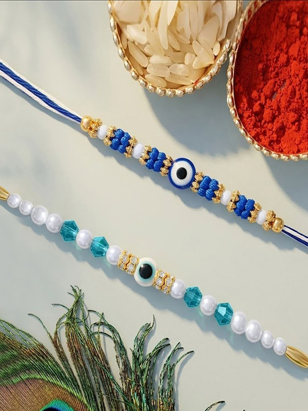 Peora Set Of 2 Gold-Toned Evil Eye Blue Beaded Rakhi With Pearl