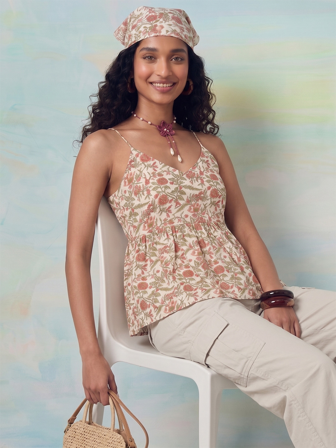 ZACCAI Sleeveless Floral Printed Peplum Top