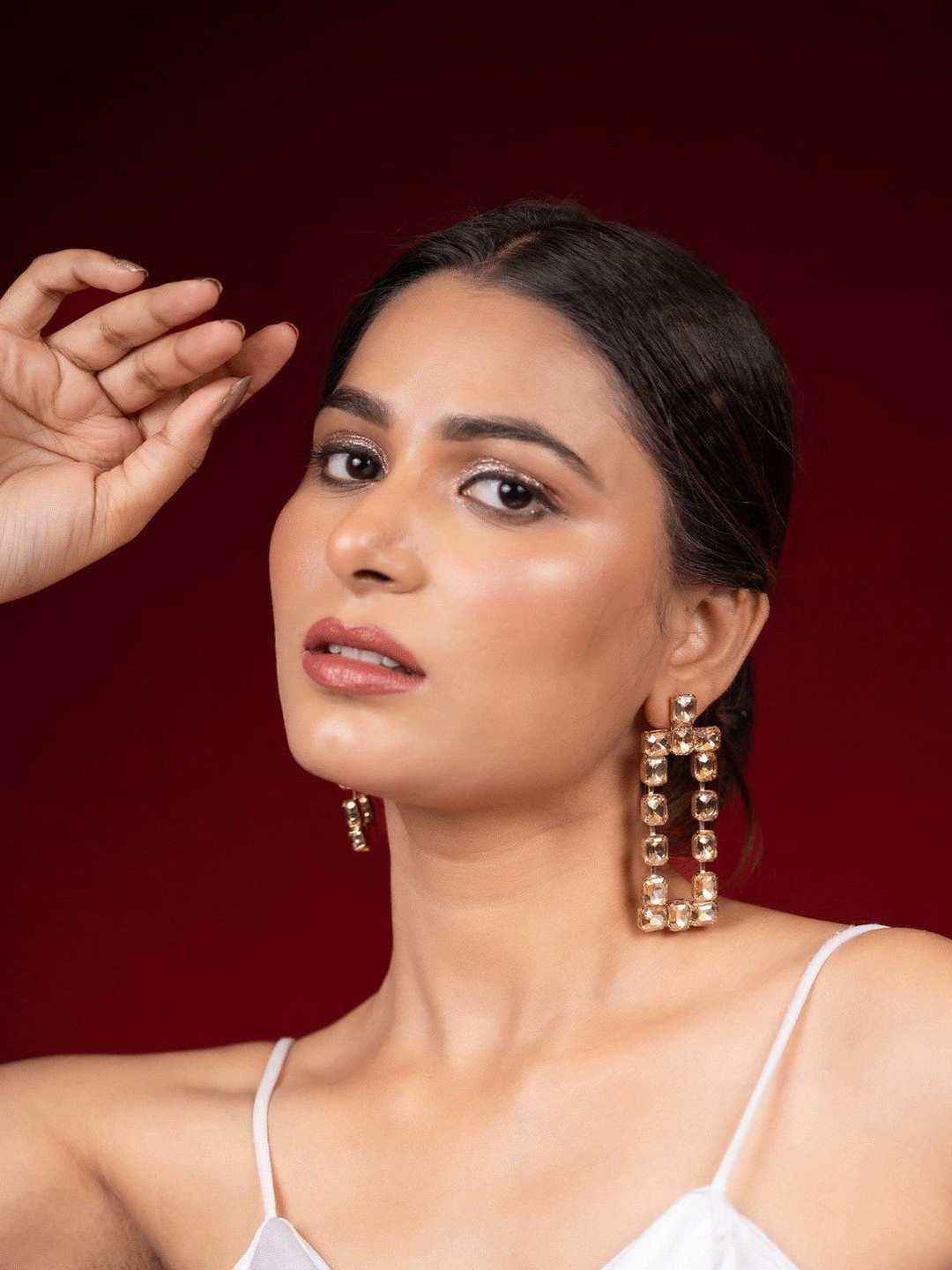 Niscka Gold-Plated Rhinestone Studded Contemporary Shaped Drop Earrings