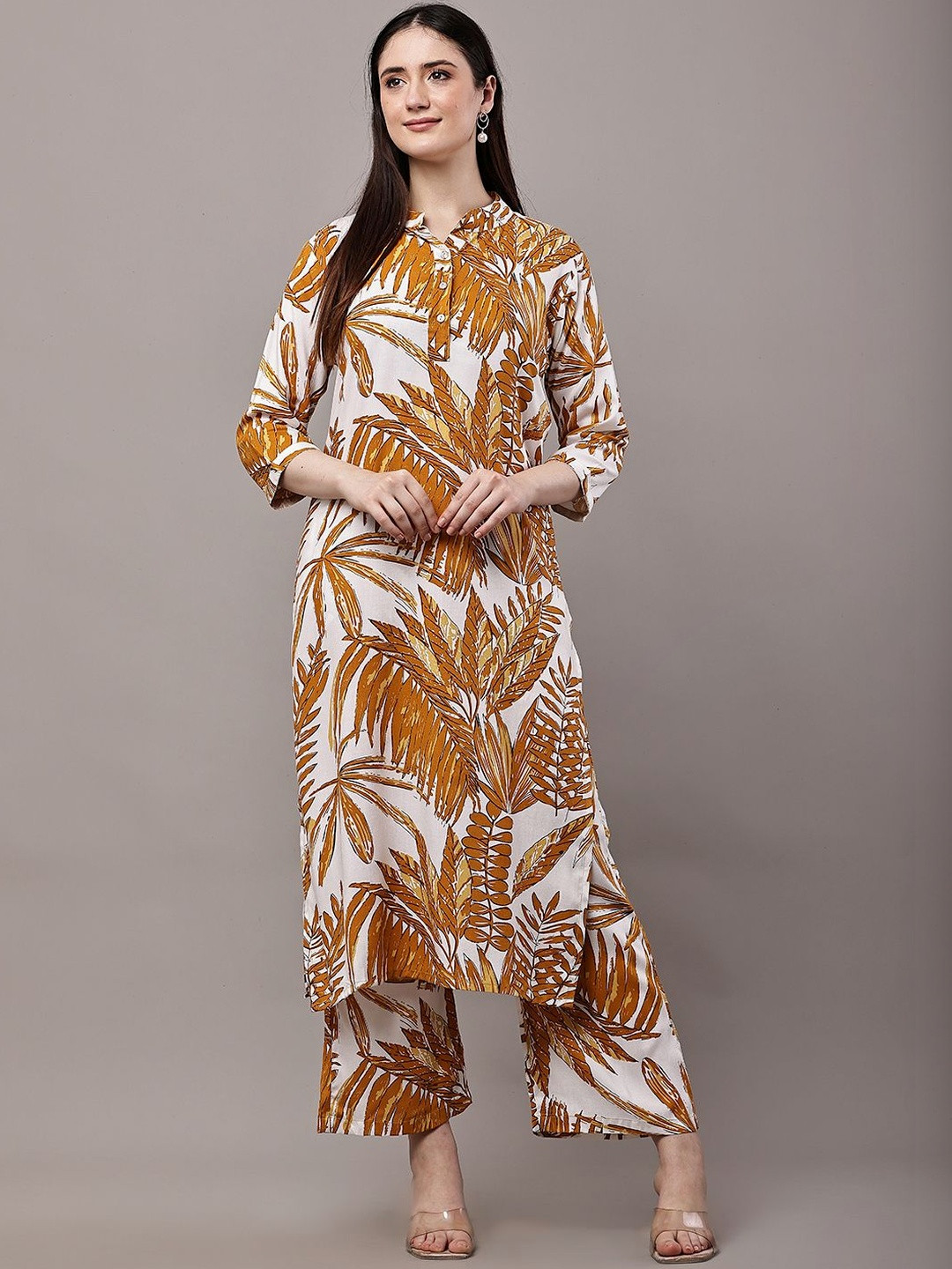 Hrikshika Fashion Women Printed Regular Mirror Work Kurta with Trousers