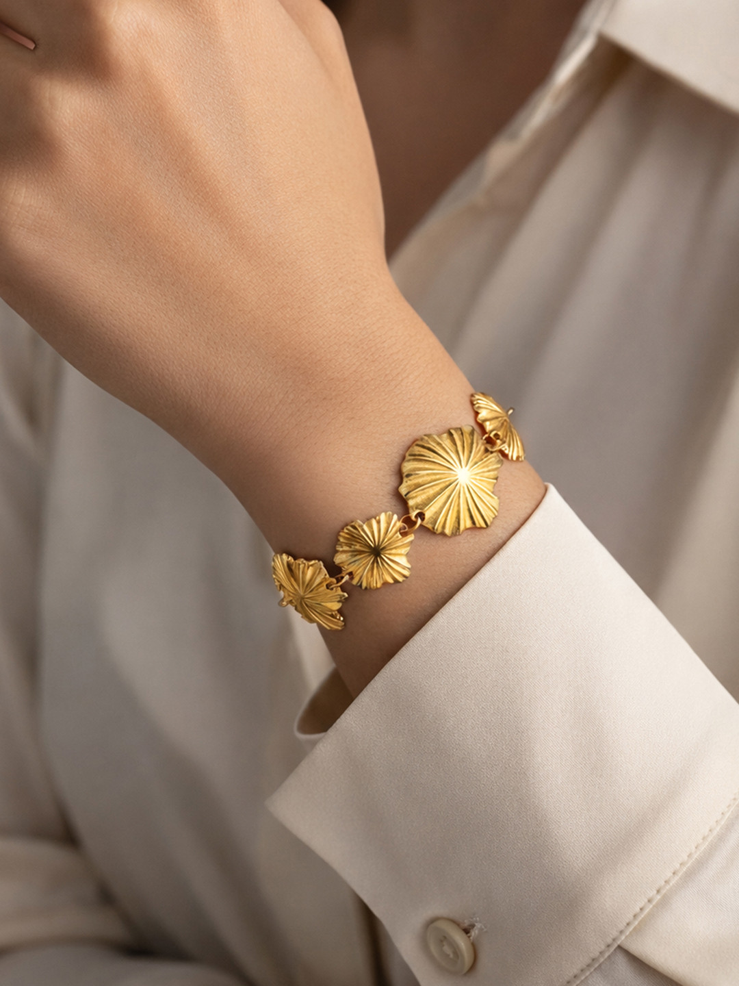 ARTKLIM Women American Diamond Gold-Plated Charm Bracelet