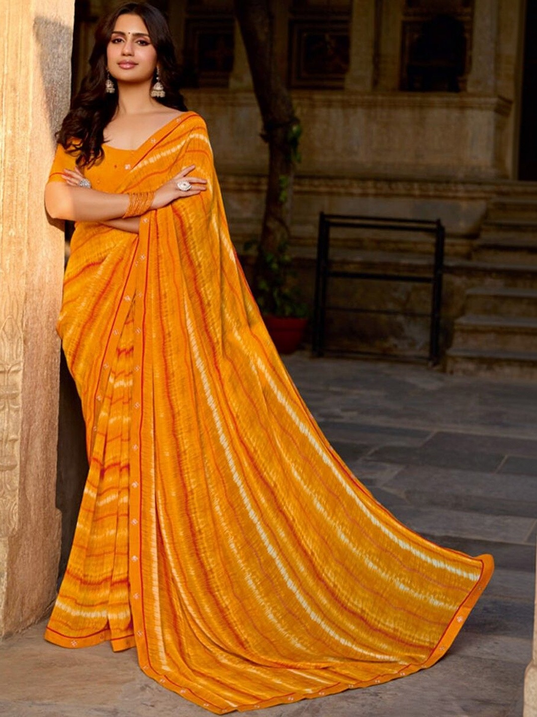 Vishal Prints Saffron Orange Printed Georgette Fancy Border Sarees