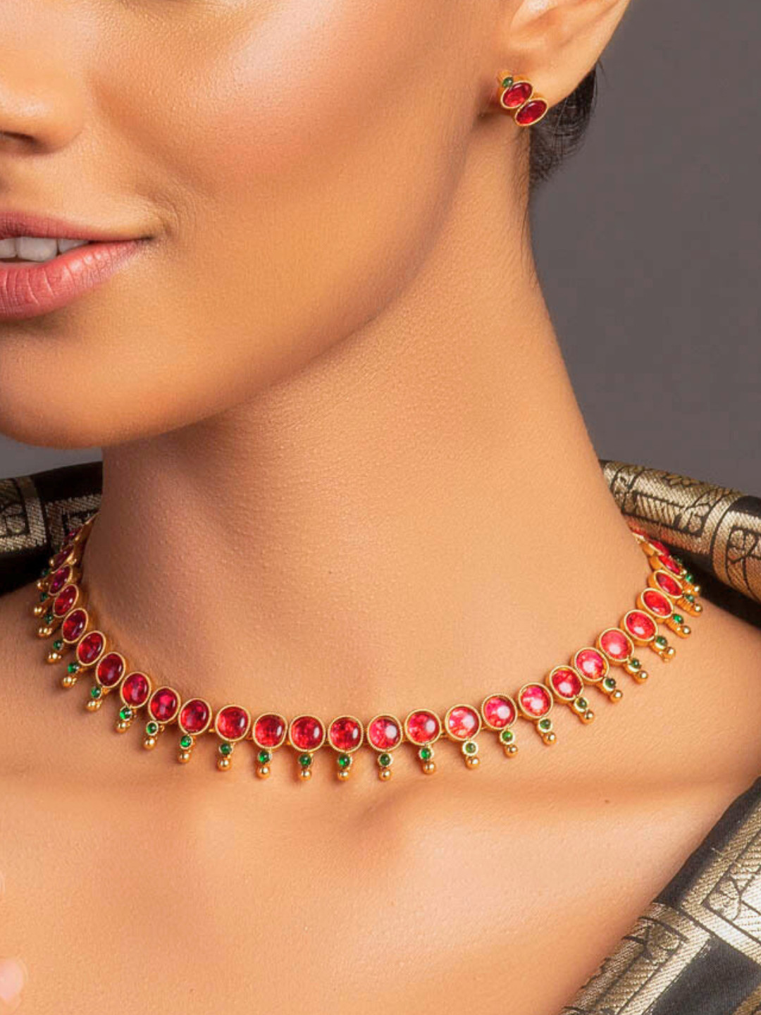 Fida Gold-Plated Magenta Pink & Green Stone-Studded Temple Jewellery Set