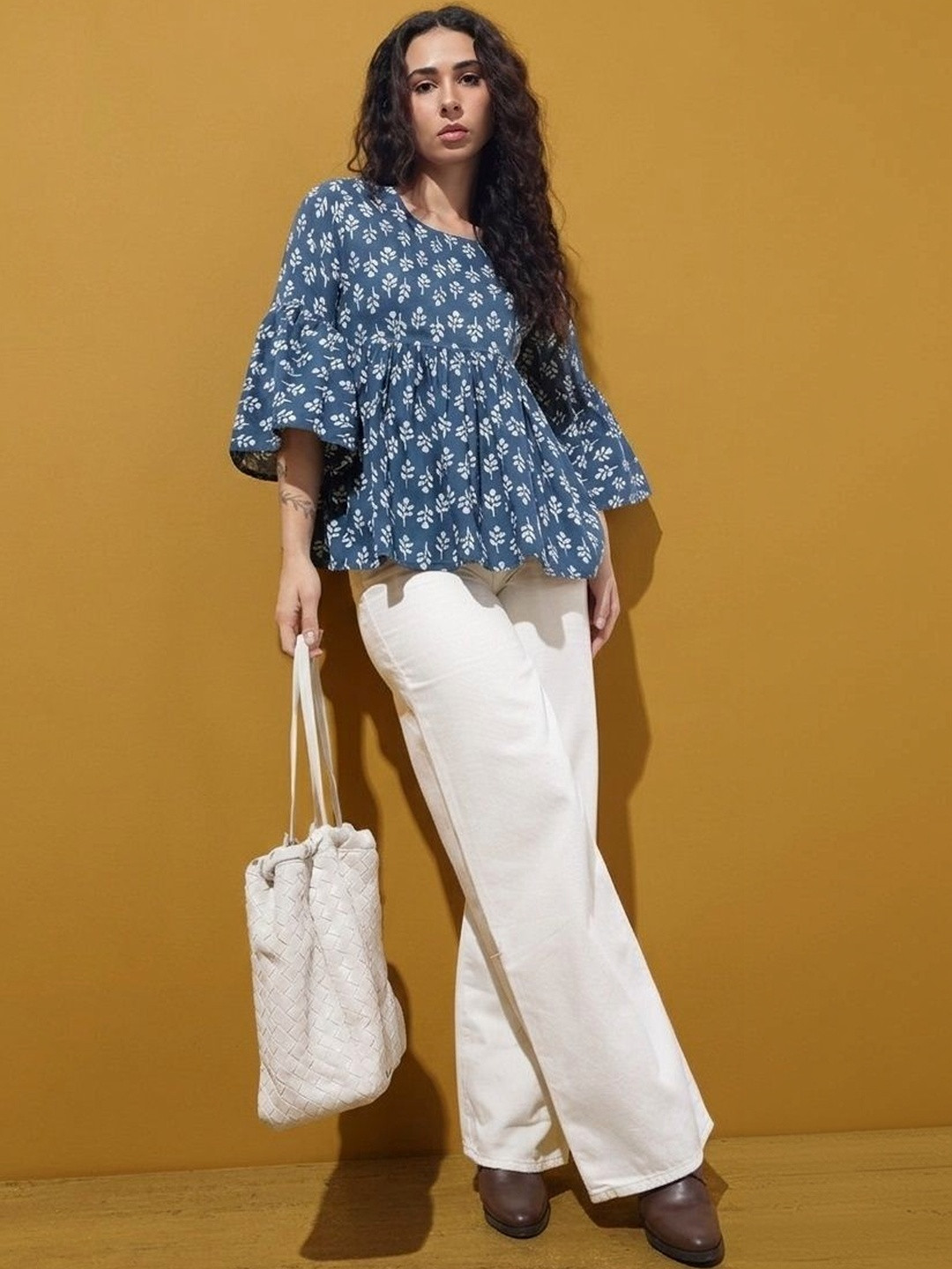 Divena Blue Floral Round Neck Peplum Tops