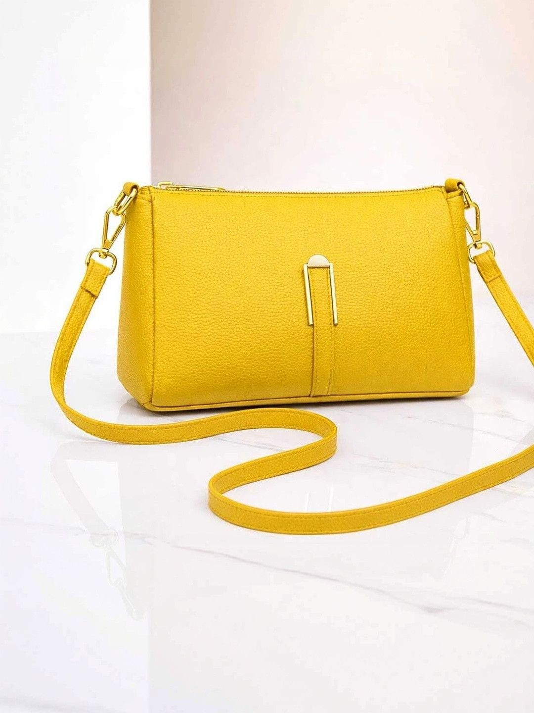 VENITY Textured Sling Bag
