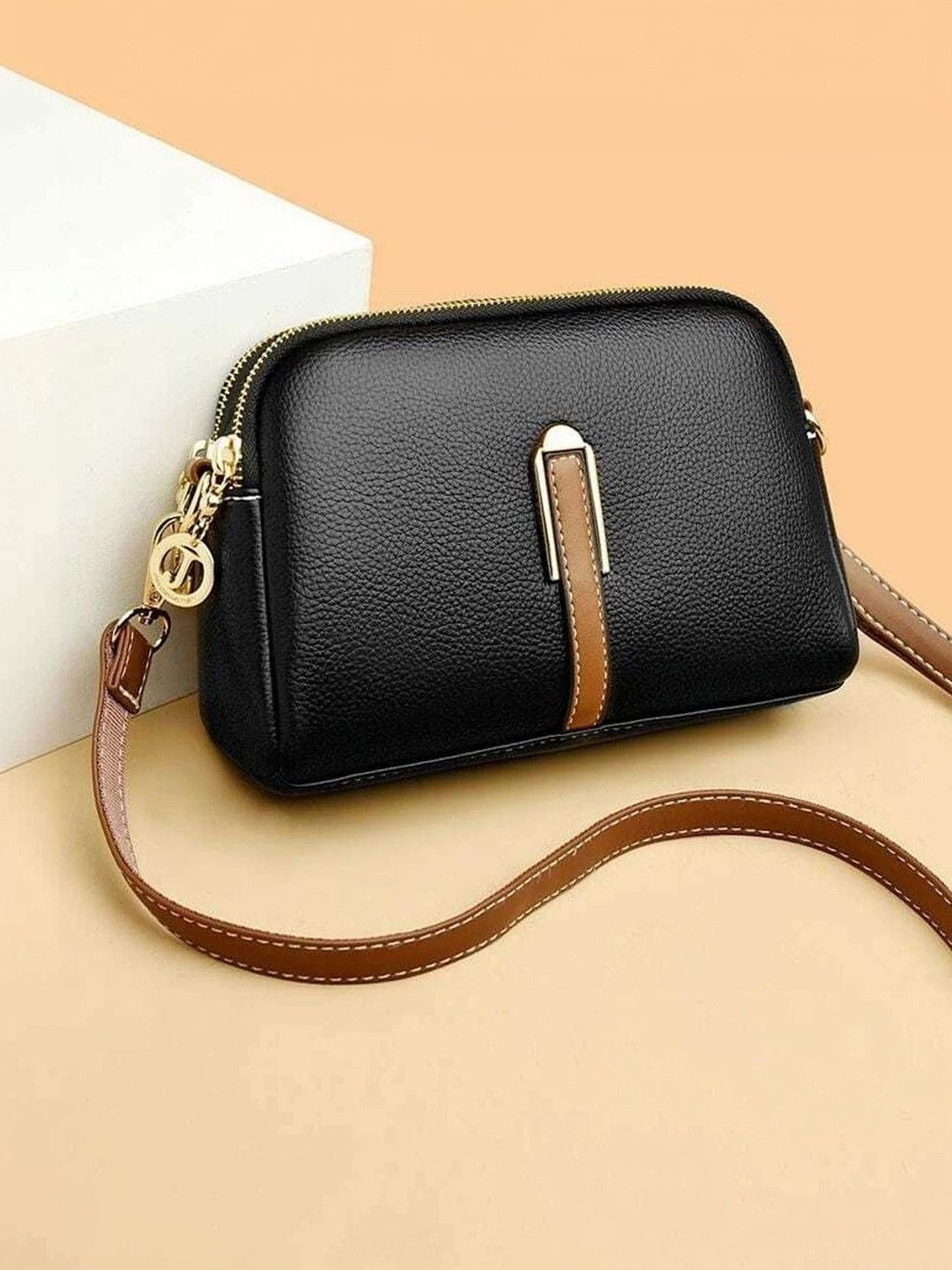 VENITY Solid Synthetic Leather Multi Compartment Structured Sling Bag