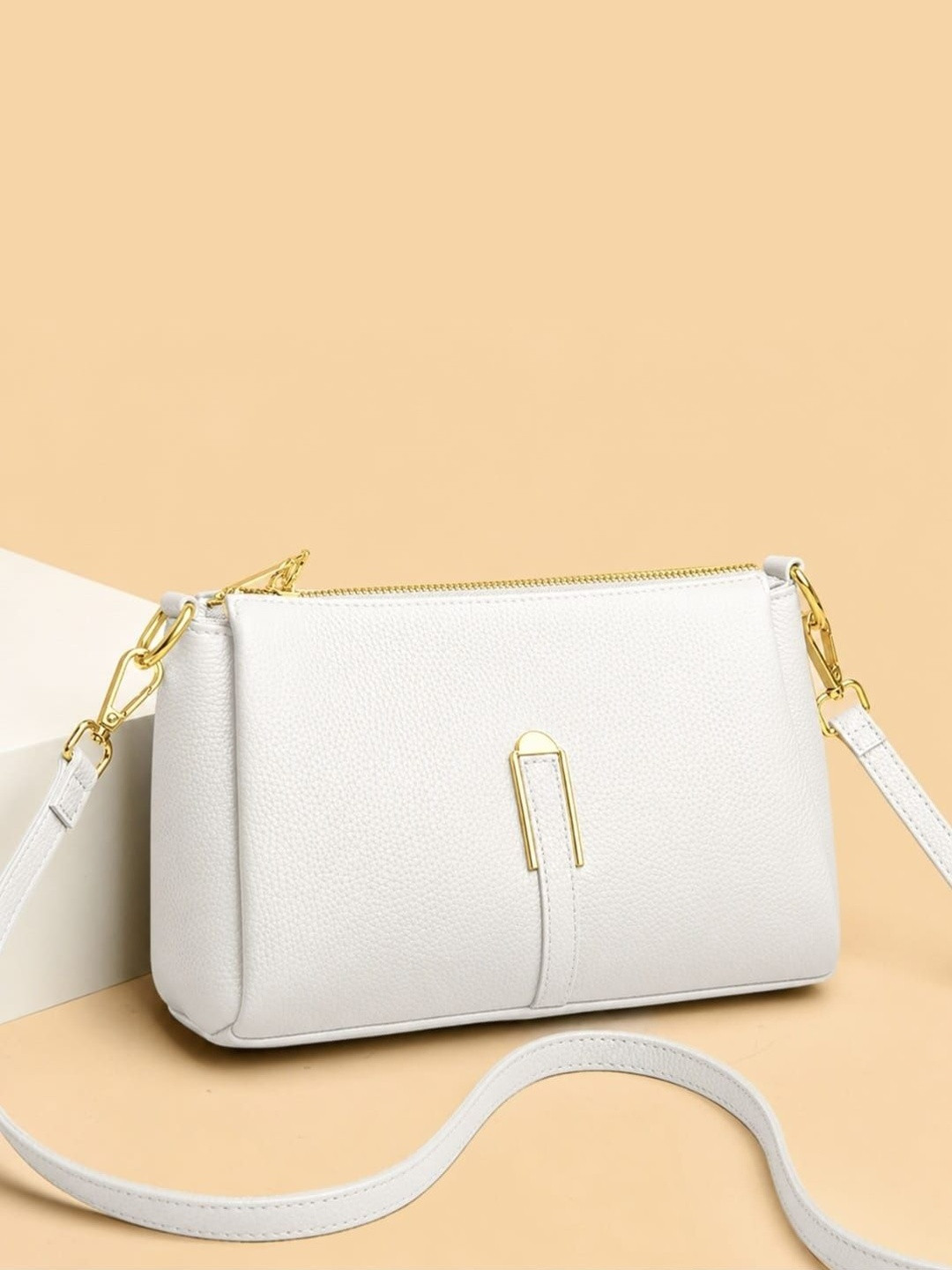 VENITY Textured Sling Bag