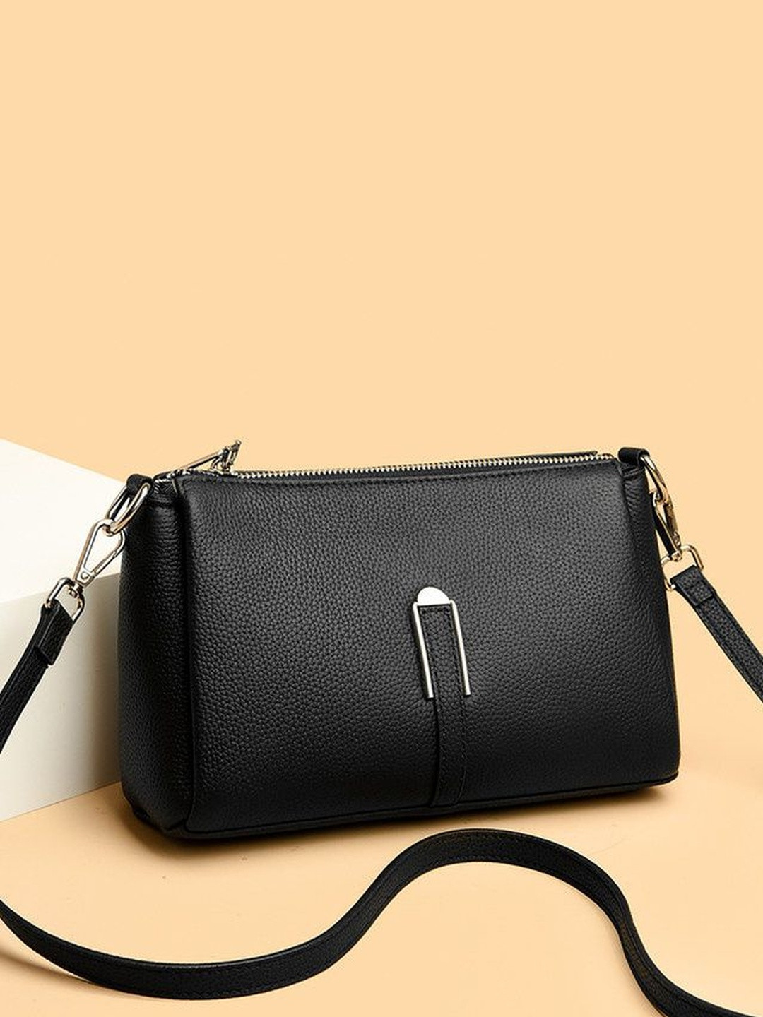 VENITY Textured Sling Bag