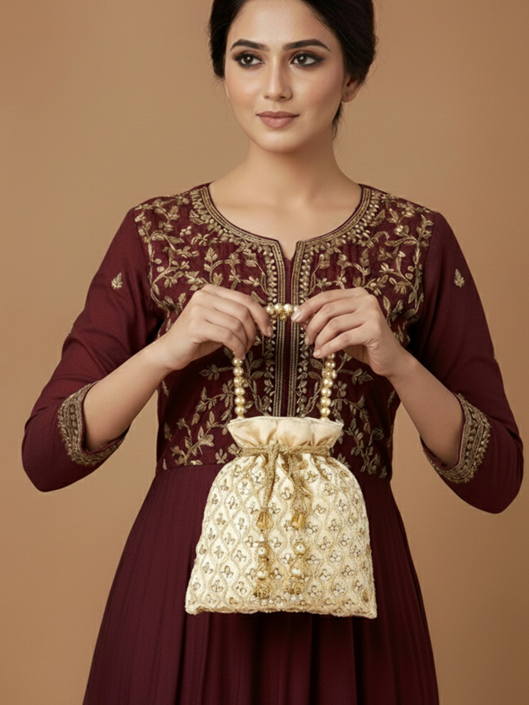 Peora Cream-Coloured & Gold-Toned Embellished Potli Clutch
