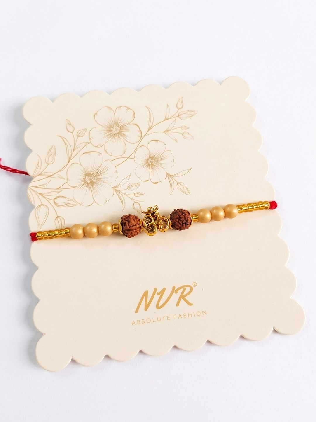 NVR Om Design Rudraksh Thread Rakhi With Roli Chawal Chandan Mishri
